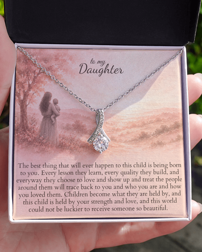 Open keepsake gift box with new mom message card and necklace